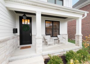 A,New,,White,Modern,Farmhouse,With,A,Dark,Wood,Door